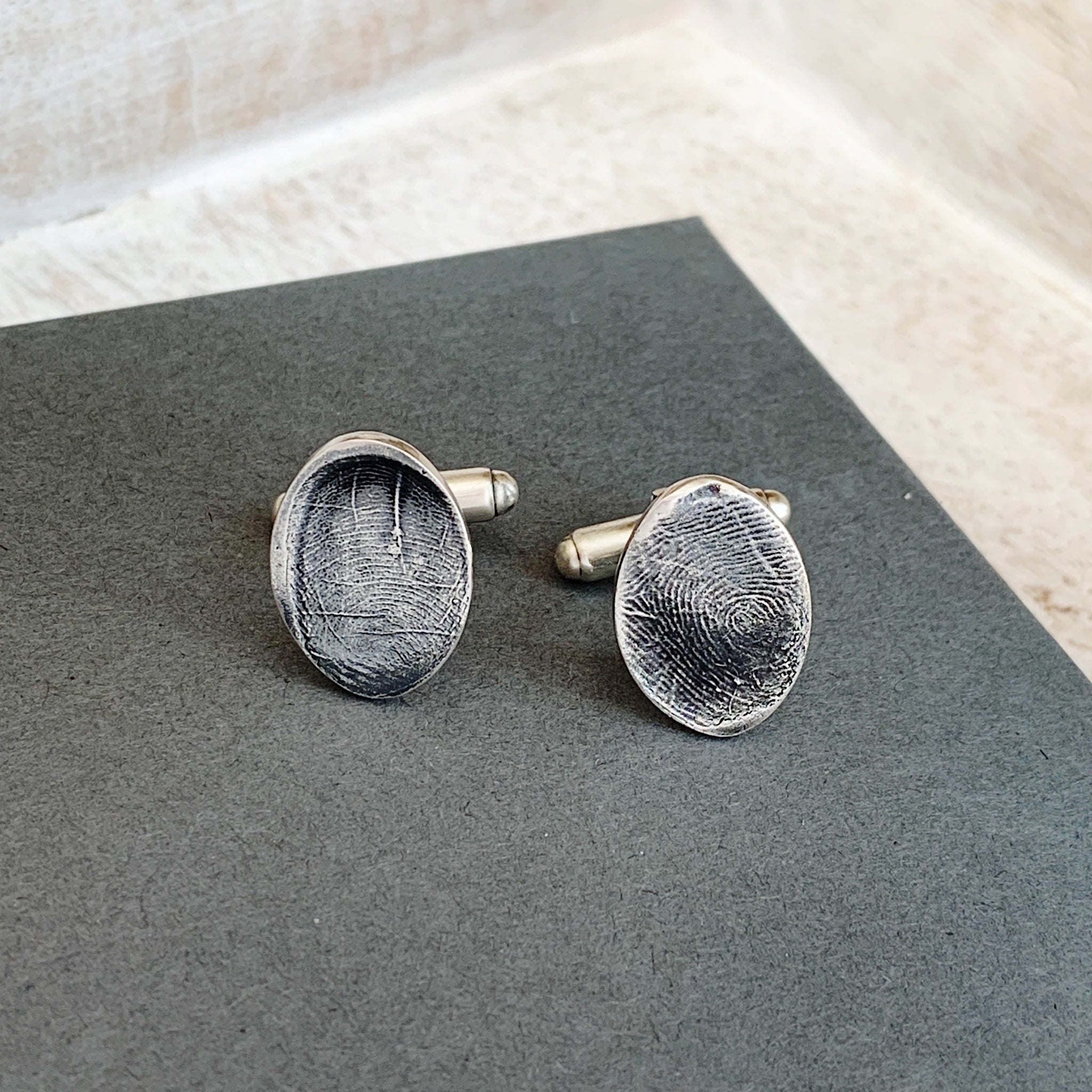 These cufflinks have been made with the print from a silicon mould